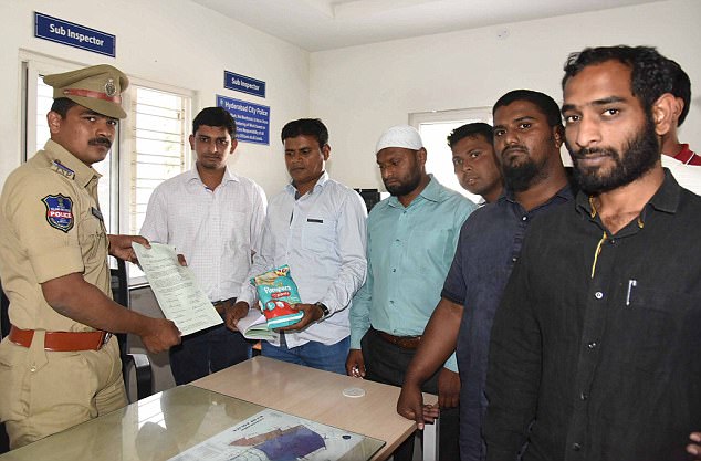Protest: Activists from the Islamic group Darsgah Jihad-o-Shahadat yesterday lodged a formal complaint about the nappies at Dabeerpura Police Station in Hyderabad Read more: http://www.dailymail.co.uk/news/article-5418129/Muslims-burn-Pampers-nappies-cartoon-cat.html#ixzz57sIRLMYc Follow us: @MailOnline on Twitter | DailyMail on Facebook